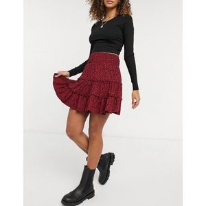 ASOS DESIGN tiered mini skirt in red and black animal print